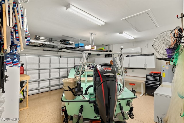 garage with water heater and refrigerator