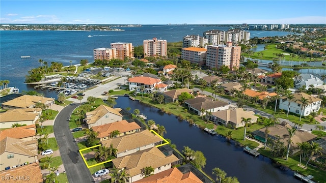 bird's eye view with a water view