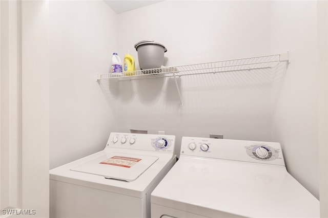 16635 Lake Circle Dr Unit 614, Fort Myers, FL 33908 - clothes washing area with separate washer and dryer