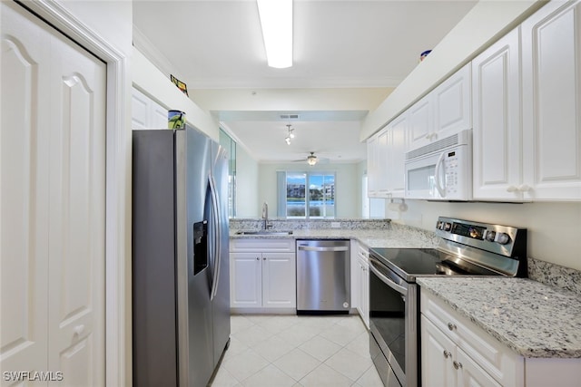 kitchen featuring white cabinetry, sink, crown molding, and appliances with stainless steel finishes