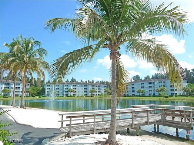 view of pool featuring a water view