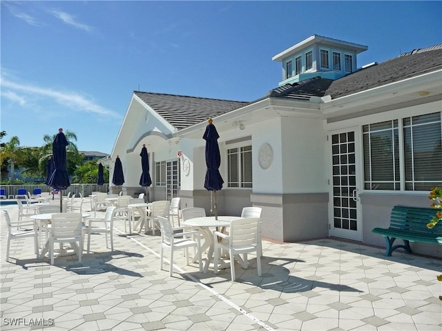 16635 Lake Circle Dr Unit 614, Fort Myers, FL 33908 - view of patio / terrace with outdoor dining area