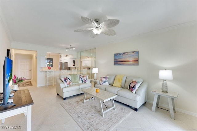 16635 Lake Circle Dr Unit 614, Fort Myers, FL 33908 - living area featuring ornamental molding, light tile patterned floors, ceiling fan, and baseboards
