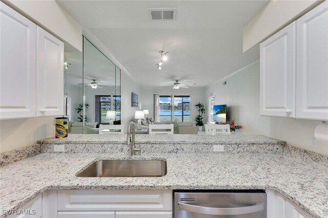 16635 Lake Circle Dr Unit 614, Fort Myers, FL 33908 - kitchen featuring dishwasher, ceiling fan, a sink, white cabinets, and ornamental molding