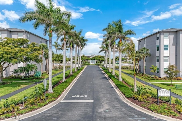 16635 Lake Circle Dr Unit 614, Fort Myers, FL 33908 - view of asphalt road featuring curbs
