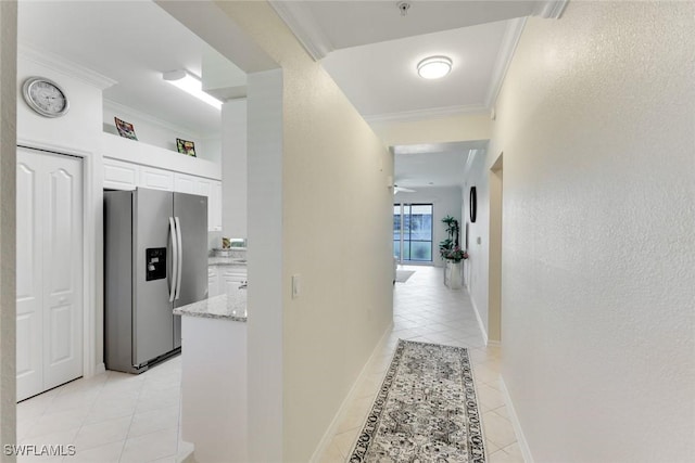 16635 Lake Circle Dr Unit 614, Fort Myers, FL 33908 - hallway with light tile patterned floors, crown molding, and baseboards