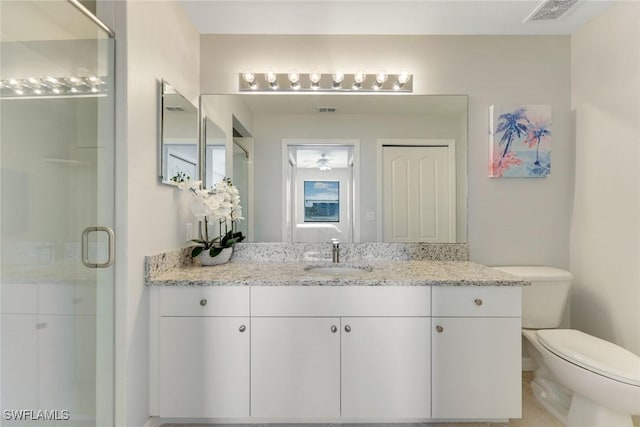 16635 Lake Circle Dr Unit 614, Fort Myers, FL 33908 - bathroom with a shower stall, toilet, and vanity