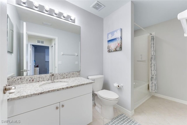 16635 Lake Circle Dr Unit 614, Fort Myers, FL 33908 - bathroom featuring tile patterned floors, toilet, vanity, baseboards, and shower / bathtub combination with curtain