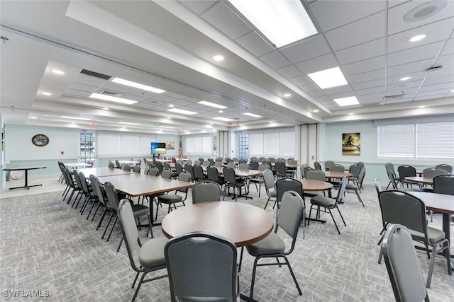 16635 Lake Circle Dr Unit 614, Fort Myers, FL 33908 - dining area featuring a raised ceiling, light carpet, a paneled ceiling, plenty of natural light, and baseboards