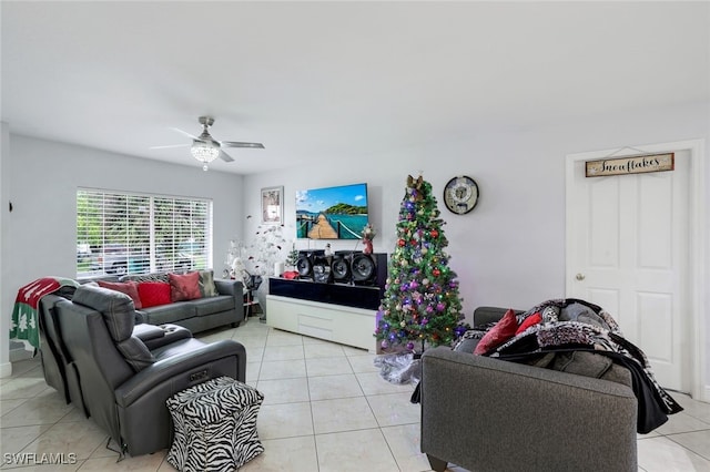 living room featuring ceiling fan and light tile patterned flooring