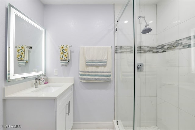 bathroom with vanity and an enclosed shower