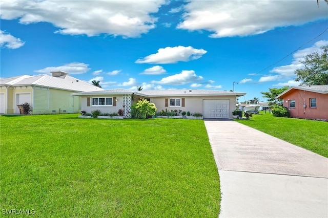 ranch-style home featuring a garage and a front lawn