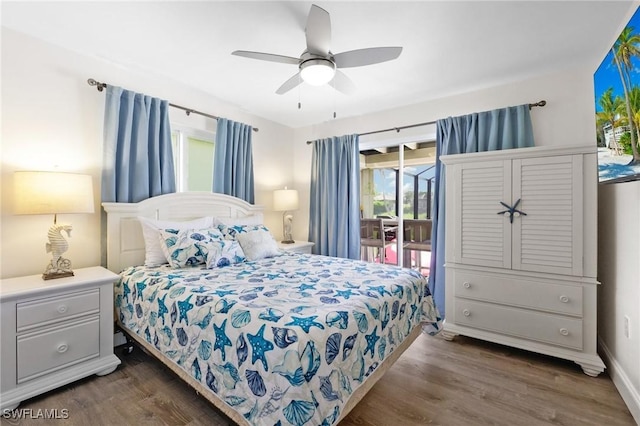 bedroom with access to outside, ceiling fan, and dark hardwood / wood-style floors