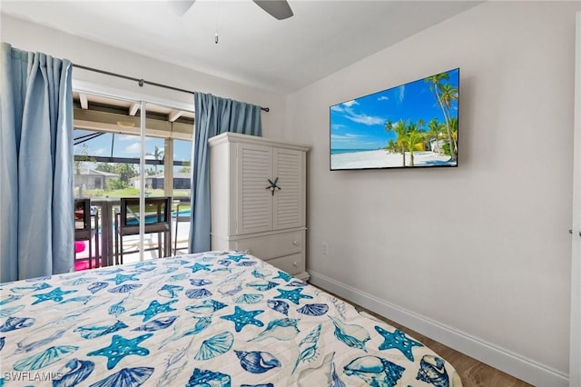 bedroom featuring access to exterior, wood-type flooring, and ceiling fan