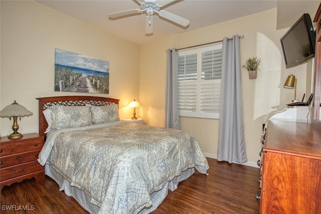 bedroom featuring ceiling fan and dark wood-type flooring