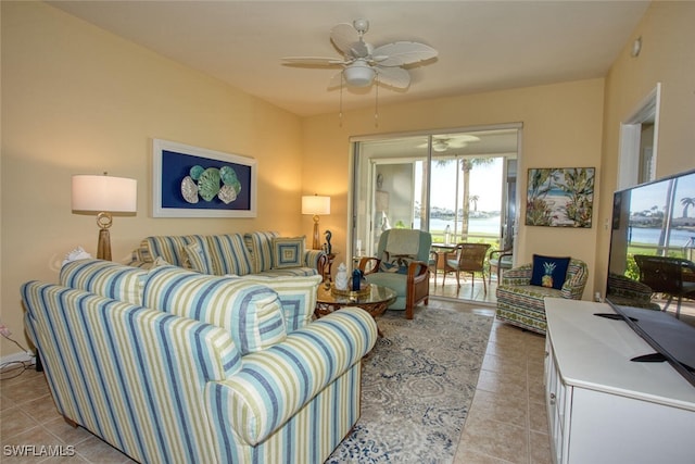 tiled living room featuring ceiling fan