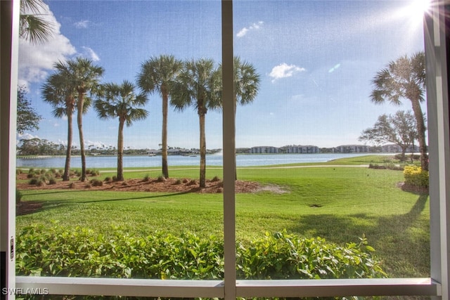 view of yard with a water view