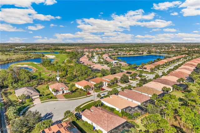 bird's eye view with a water view