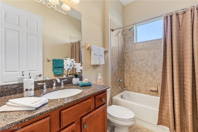 full bathroom with vanity, shower / bath combination with curtain, and toilet