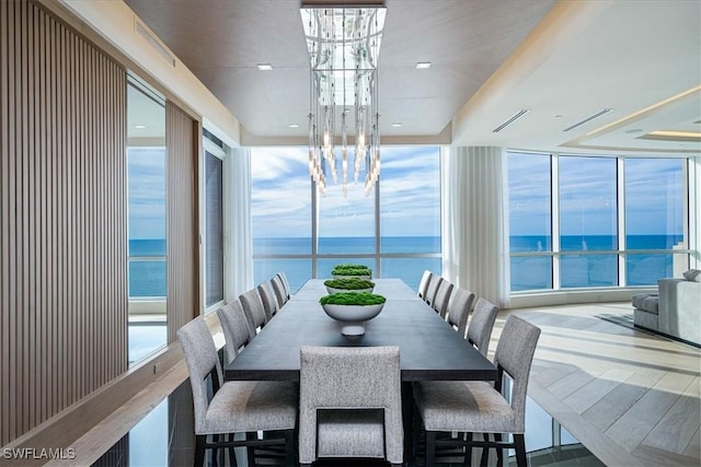 dining room with a water view