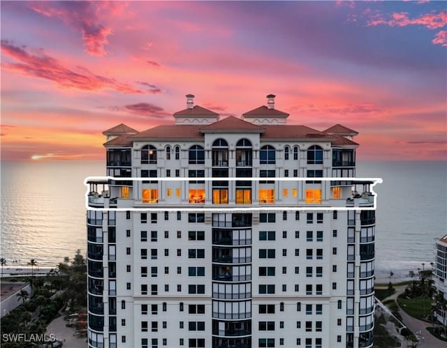 outdoor building at dusk with a water view