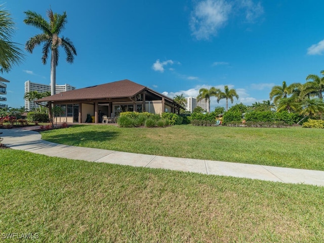 view of front of property with a front lawn