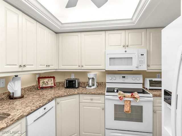 kitchen with white cabinetry, ceiling fan, light stone countertops, and white appliances