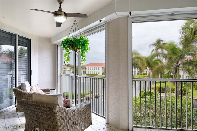 sunroom / solarium with ceiling fan