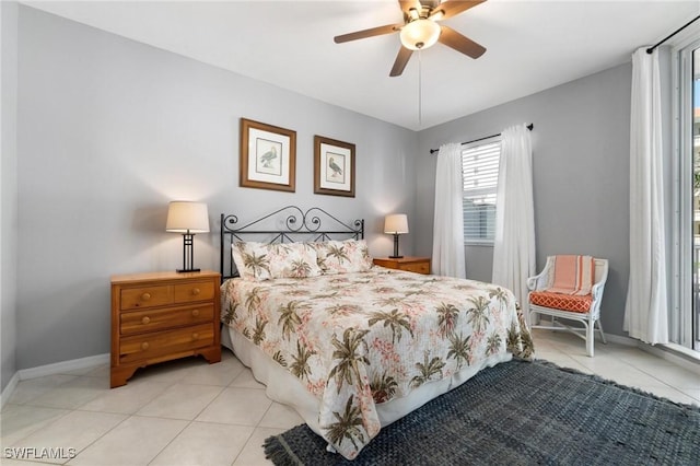 tiled bedroom with ceiling fan