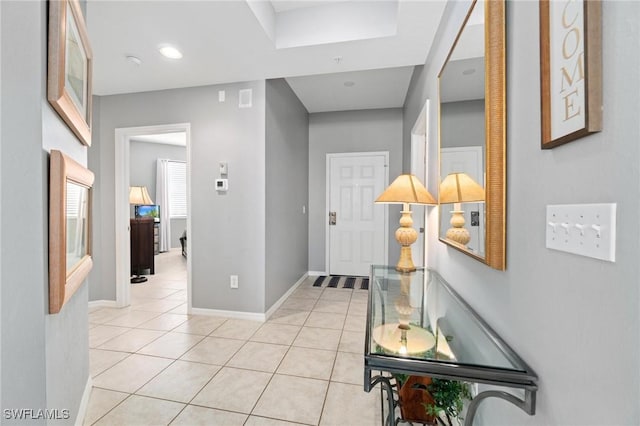 entryway featuring light tile patterned floors