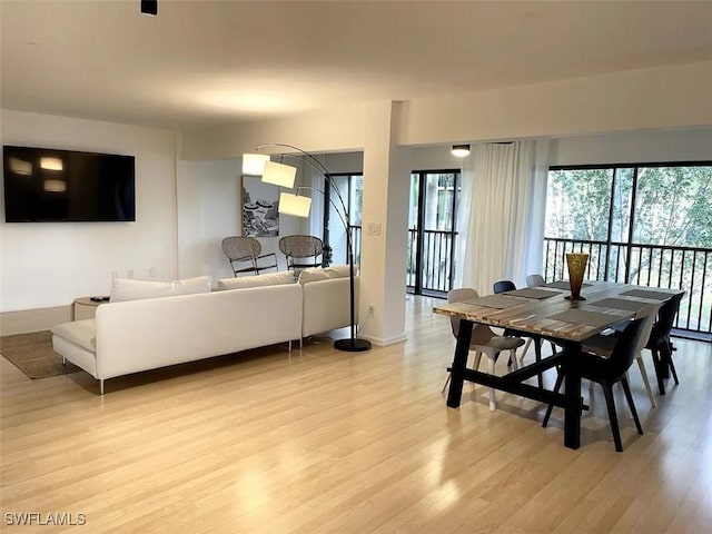 dining room with light wood-type flooring