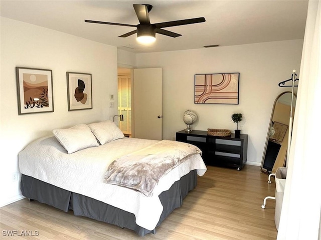 bedroom featuring ceiling fan and light hardwood / wood-style flooring