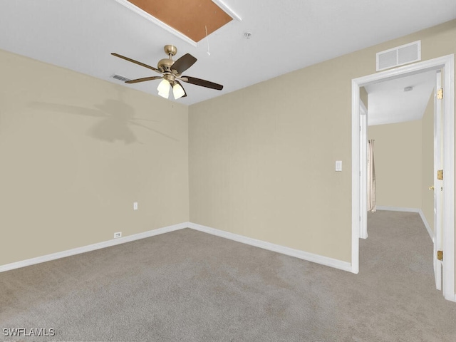 empty room with light colored carpet