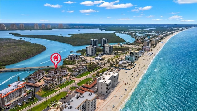 aerial view featuring a water view and a beach view