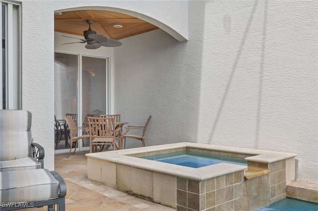 view of patio with ceiling fan