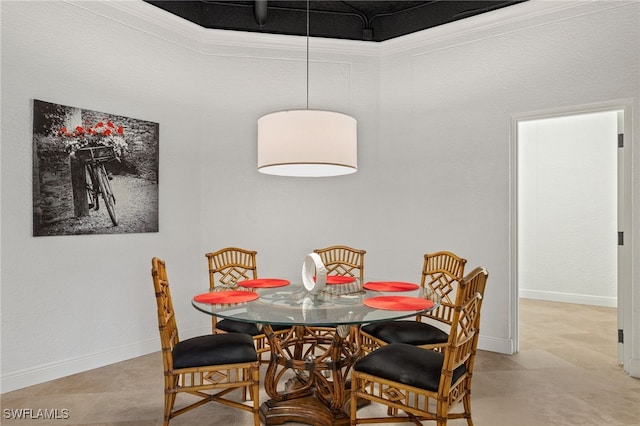 dining room with crown molding