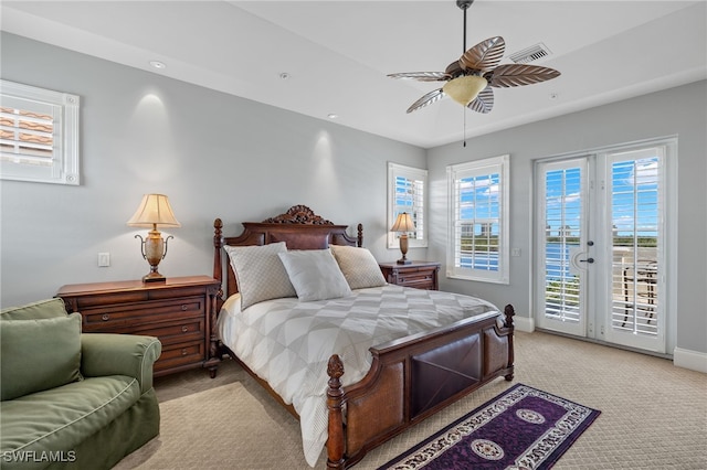 carpeted bedroom with ceiling fan, access to outside, and french doors