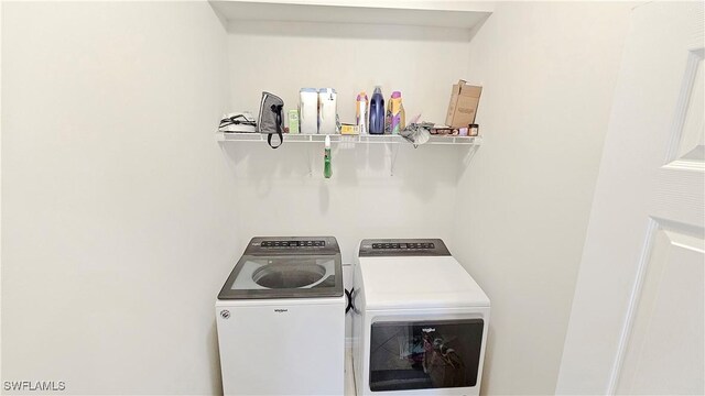 laundry area featuring independent washer and dryer