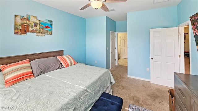 carpeted bedroom with ceiling fan