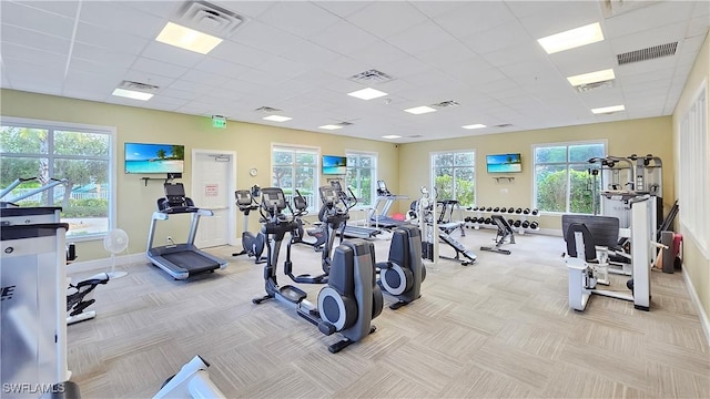 gym with a drop ceiling