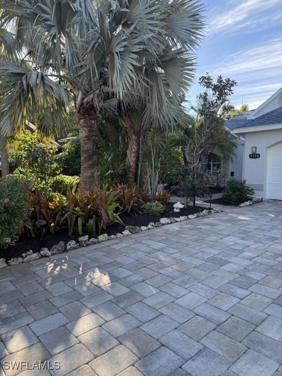 view of patio / terrace with a garage