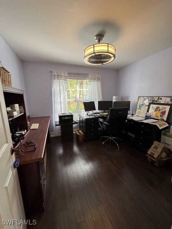 office with dark wood-type flooring