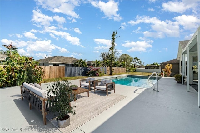 view of swimming pool featuring a patio and an outdoor hangout area