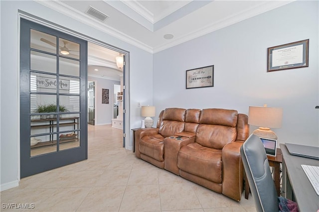 living room with light tile patterned floors and crown molding