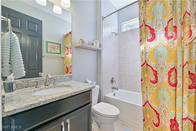 full bathroom with vanity, toilet, and shower / tub combo