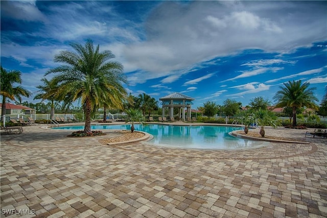 view of swimming pool featuring a patio