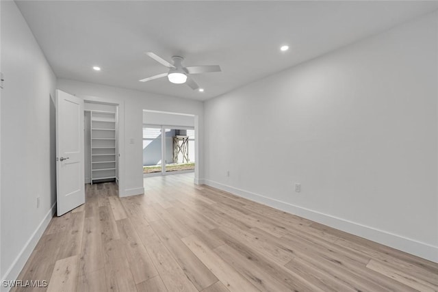 interior space with recessed lighting, baseboards, ceiling fan, and light wood finished floors