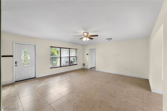 entrance foyer featuring ceiling fan