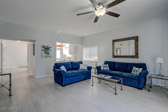 living room with ceiling fan