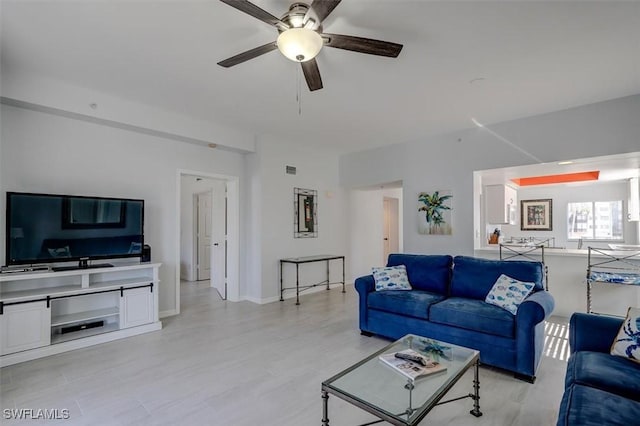 living room with ceiling fan